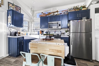 Escape to the lake in this adorable 2023 tiny home located in - photo 4