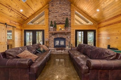 Discover a rare opportunity to own a stunning log home along the - photo 2