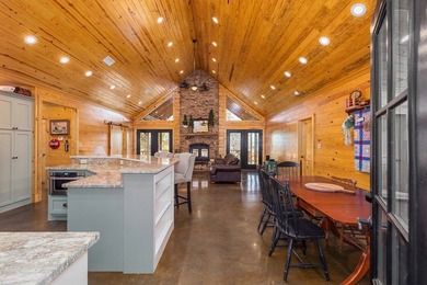 Discover a rare opportunity to own a stunning log home along the - photo 5