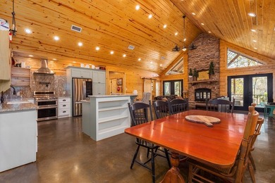 Discover a rare opportunity to own a stunning log home along the - photo 6