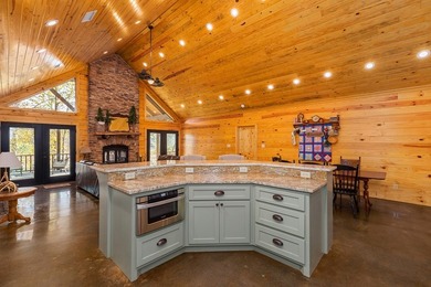 Discover a rare opportunity to own a stunning log home along the - photo 7