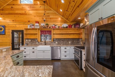 Discover a rare opportunity to own a stunning log home along the - photo 8