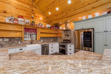 Discover a rare opportunity to own a stunning log home along the - photo 9