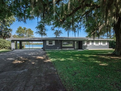 Completely remodeled 4-bed, 3-bath smart lakefront home on a - photo 2