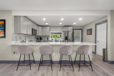 Completely remodeled 4-bed, 3-bath smart lakefront home on a - photo 5