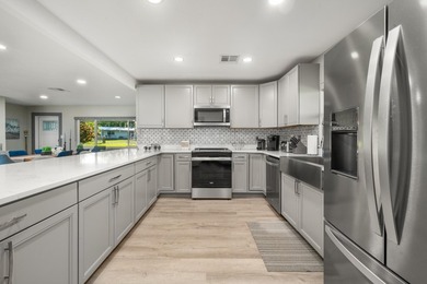 Completely remodeled 4-bed, 3-bath smart lakefront home on a - photo 7