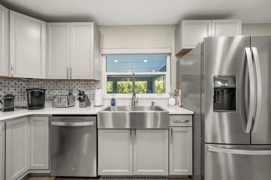 Completely remodeled 4-bed, 3-bath smart lakefront home on a - photo 8