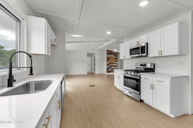 Here is a wonderfully remodeled home at an affordable price. All - photo 1