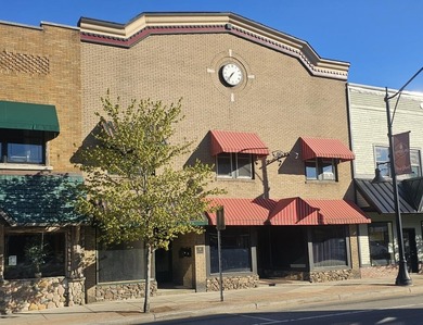 Positioned in the heart of the Tupper Lake business district - photo 1