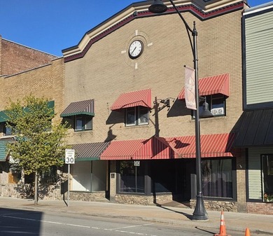 Positioned in the heart of the Tupper Lake business district - photo 2