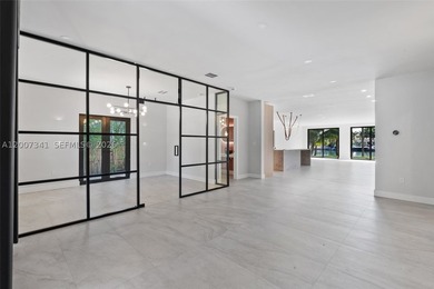 Completely redesigned modern waterfront home in the exclusive - photo 10
