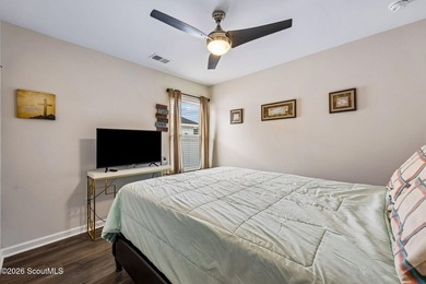 Built in 2023, beautifully maintained, and serving up pond views - photo 24