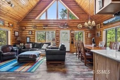 Escape to the mountains in this beautifully updated log cabin in - photo 3