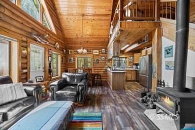 Escape to the mountains in this beautifully updated log cabin in - photo 5