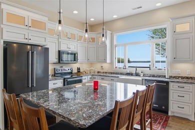 Do you want a beautiful lake home with a sandy beach, on a level - photo 17