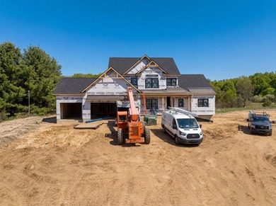 Welcome home! This stunning modern farmhouse by TMR Builders - photo 4