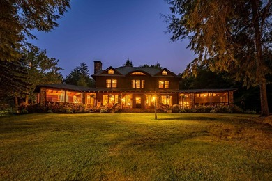 'Tojenka' is a rare Big Moose Lake estate offering an - photo 1