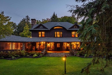 'Tojenka' is a rare Big Moose Lake estate offering an - photo 2