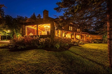 'Tojenka' is a rare Big Moose Lake estate offering an - photo 9