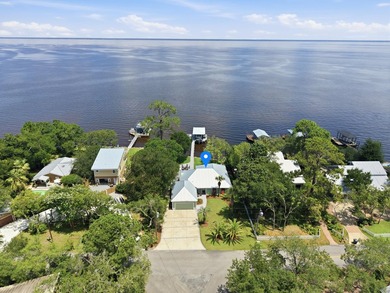 Beautifully remodeled coastal home featuring a private dock - photo 1