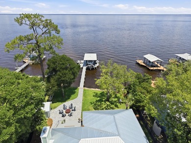 Beautifully remodeled coastal home featuring a private dock - photo 7