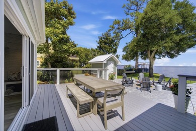 Beautifully remodeled coastal home featuring a private dock - photo 8