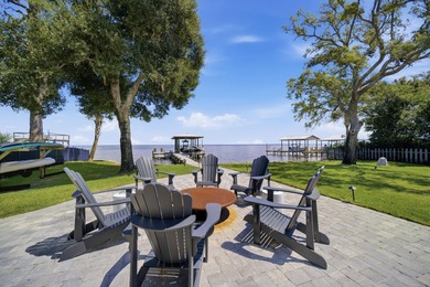 Beautifully remodeled coastal home featuring a private dock - photo 9