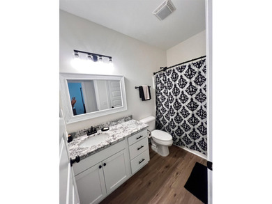 Welcome to this spacious and inviting like-new ranch style home - photo 33