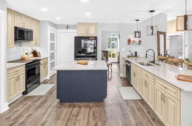 Nestled on a .54 acre corner cul-de-sac lot in the gated - photo 7