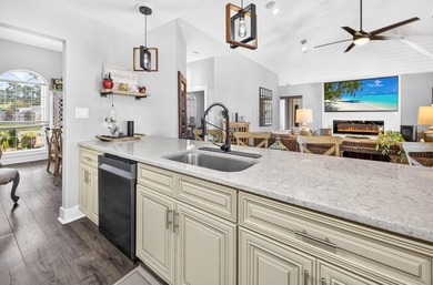 Nestled on a .54 acre corner cul-de-sac lot in the gated - photo 9