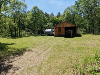 Set on 3.6 acres on Baker Rd, this unique property offers a - photo 2