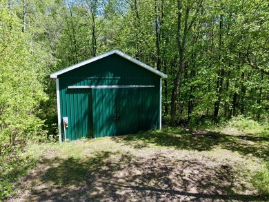 Set on 3.6 acres on Baker Rd, this unique property offers a - photo 4