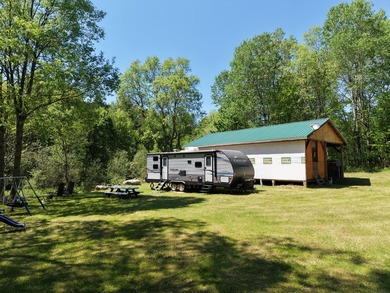 Set on 3.6 acres on Baker Rd, this unique property offers a - photo 5
