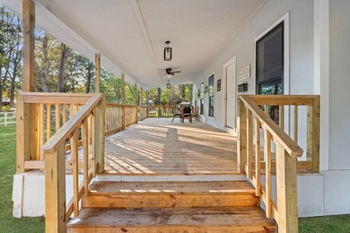 Nestled on a sprawling 0.68-acre parcel of unrestricted - photo 3
