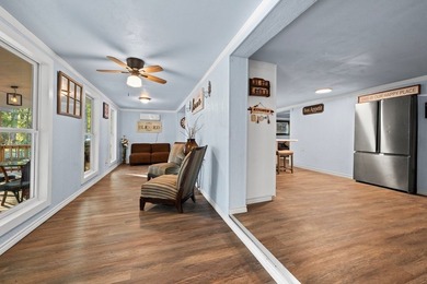 Nestled on a sprawling 0.68-acre parcel of unrestricted - photo 7