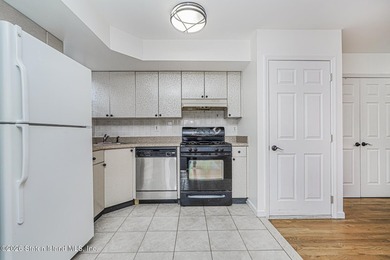 Welcome to this well-maintained 2-bedroom, 1.5-bath condo in the - photo 12