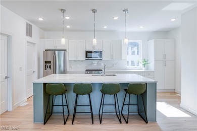 Introducing 'Edgewater South', a Fully Completed townhome with - photo 2