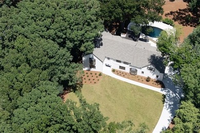 Masterfully renovated and expanded by Hudgins Property Group - photo 3
