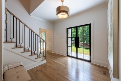 Masterfully renovated and expanded by Hudgins Property Group - photo 5