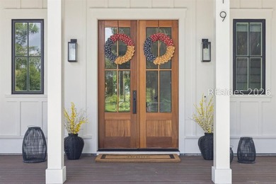 Step into a truly exceptional marshfront retreat where modern - photo 4