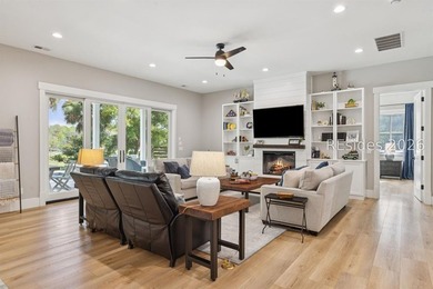 Step into a truly exceptional marshfront retreat where modern - photo 7