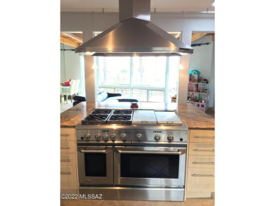 Walls of windows with million dollar views from this two units