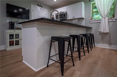 Distinctive architecture, extensive updates, and inviting - photo 9
