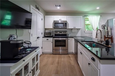 Distinctive architecture, extensive updates, and inviting - photo 10