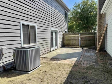 This charming three-bedroom, two-bathroom patio home is located - photo 16