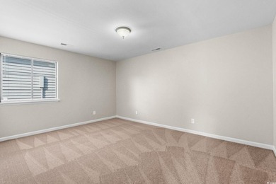 This charming three-bedroom, two-bathroom patio home is located - photo 18