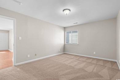 This charming three-bedroom, two-bathroom patio home is located - photo 19