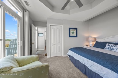 This meticulously maintained four-bedroom, three-bath waterfront