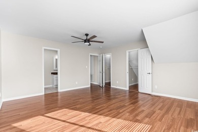 This charming three-bedroom, two-bathroom patio home is located - photo 23