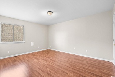 This charming three-bedroom, two-bathroom patio home is located - photo 27